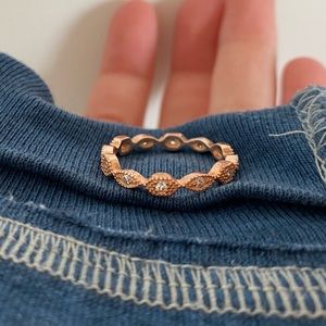 Brand new rose gold ring with eye designs. No flaws